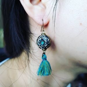 Flower pattern with tassel earring